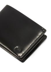 Black leather women's wallet PORES-0976-99(Z25), close-up of product detail, view on white background.