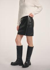 Black leather mini skirt SPCDS-0079-3206(Z25) - side view of the product on a model on a white background. Half of the silhouette visible.