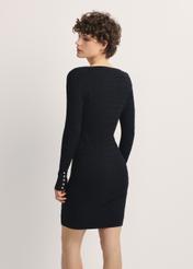 Black midi dress with cable knit SUKDT-0202A-99(Z25), product visible from the back on the model, half of the silhouette visible.