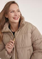 Short beige women's jacket KURDT-0601-24(Z25), close-up of the product detail on the model. Half of the silhouette visible.