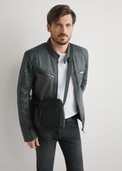 Men's black shoulder bag TORMN-0391-99(W26) - front view of the product, on a model, against a light background. Knee-length silhouette visible.