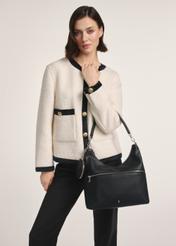 Black handbag with purse TOREC-0886A-99(Z25), front view of the product on a model, half of the silhouette visible.
