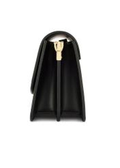 Black women's handbag made of imitation leather TOREC-1081-99(W26), side view of the product on a white background.