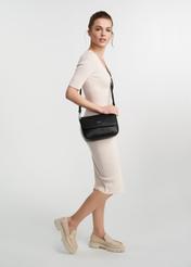 Black rectangular women's messenger bag TOREC-0930B-99(Z25), product view on model's shoulder. Full body visible.