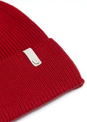 Red women's hat with merino wool CZADT-0178A-4B(Z26), close-up of the product detail, view on a white background.