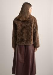 Women's brown short fur coat FUTDP-0058-1H(Z26), product view from the back on the model. Half of the silhouette visible.