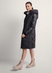 Women's black winter jacket with hood KURDT-0478-99(Z25), front view of the product on the model. Full body visible.