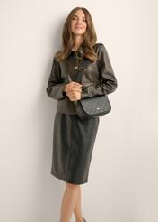 Small black monogrammed messenger bag TOREC-1289-9P(Z26), product view on model's shoulder. Half silhouette visible.