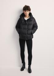 Black women's down jacket KURDT-0585-99(Z25), product visible from the front on the model, the entire silhouette is visible.