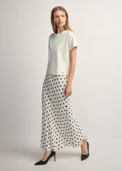 Women's white polka dot skirt SPCDT-0122-0P(W26), front view of the product on the model. Full body visible.