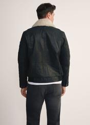 Men's black leather aviator bag KURMS-0214A-5365(Z25), back view of the product on the model. Half of the silhouette visible.