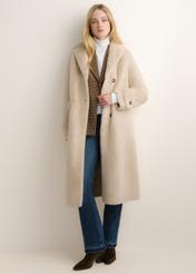Women's beige long fur coat FUTDP-0080-1B(Z26), front view of the product on the model. The entire silhouette is visible.