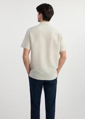 Beige men's shirt with short sleeves KOSMT-0327-81(W25) - back view on white background.