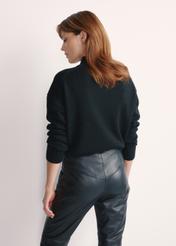 Black classic women's sweater SWEDT-0186 A-99(Z 25), product view from the back on the model, half of the silhouette visible.