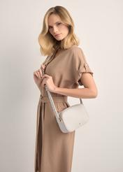Cream leather women's handbag TORES-1103B-0B(W26), product view on model's shoulder. Half silhouette visible.