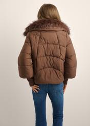 Women's brown jacket with detachable fur KURDT-0704-1H(Z26), back view of the product on the model. Half of the silhouette visible.