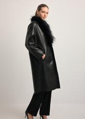 Black leather double-sided women's sheepskin coat KOZDS-0093-1396(Z25), side view of the product on the model. Full body visible.
