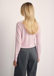 Light pink women's sweater SWEDT-0250-34(Z25), product view from the back on the model. Half of the silhouette visible.