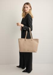 Beige pebbled shopper bag TOREC-1252-1B(Z26), front view of the product on a model. Full body visible.
