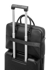 Black leather laptop bag TORMS-0494-99(W26) - close-up detail, on suitcase, on white background.