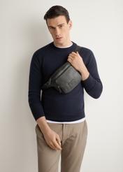 Men's black leather waist bag TORMS-0529-99(Z26) - front view of the product, on a model, on a light background.