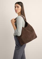 Brown suede shopper bag TORES-1403-1H(Z26), front view of the product on a model, half of the silhouette visible.