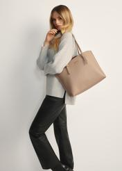 Beige large shopper bag TOREC-1088-81(Z25), product view from the front on the model, the whole silhouette is visible.