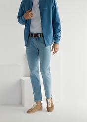 Beige leather sports shoes BUTYM-0534-1B(W26), front product view on model's feet, on light background.