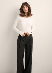 Women's cream ribbed longsleeve LSLDT-0058-0B(Z26), front view of the product on the model. Half of the silhouette visible.