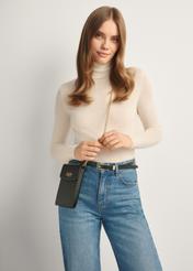 Black women's bag TOREC-1112-99(Z25), front view of the product on the model, half of the silhouette visible.