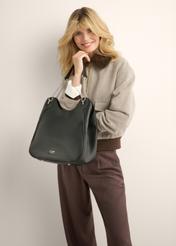 Black women's shopper bag TOREC-1283-9I(Z26), front view of the product on the model's silhouette, on a light background.
