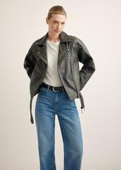 Women's leather biker jacket KURDS-0605-99(W26), front view of the product on the model. Half of the silhouette visible.