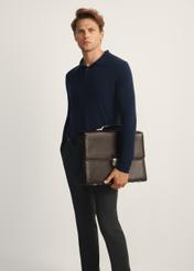 Men's leather briefcase TORMS-0478-89(Z25), front view of the product on the model, half of the silhouette visible.