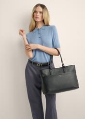 Women's leather handbag with laptop compartment TORES-1314-99(Z26), product view on model's shoulder, against a light background.