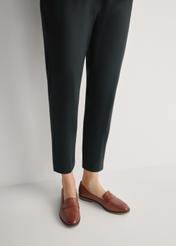 Women's leather moccasins in cognac color BUTYD-1067-1F(W26), front view of the product on the model's feet.