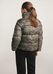 Women's snakeskin jacket KURDT-0598-54(Z25), back view of the product on the model. Half of the silhouette visible.