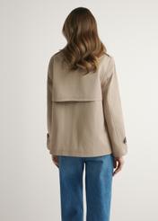 Beige women's short jacket KURDT-0556-1C(W26), back view of the product on the model. Half of the silhouette visible.