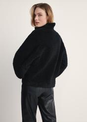 Women's black fur coat FUTDP-0021B-99(Z25), back view of the product on the model. Half of the silhouette visible.