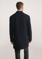 Navy blue men's coat PLAMT-0006-69(Z25), product visible from the back on the model, half of the silhouette visible.