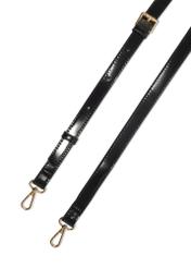 Black women's handbag with gloss TOREC-1110-99(Z25), close-up of the product's detachable strap, view on a white background.