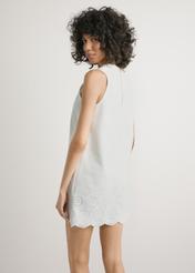 Women's white cotton dress SUKDT-0275-0B(W26), back view of the product on the model. Half of the silhouette visible.