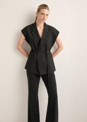 Women's black oversize suit vest KAMDT-0039-99(Z26), front view of the product on the model. Full body visible.