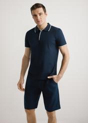 Men's dark navy polo shirt POLMT-0092-7E(W26), front view of the product on the model. Half of the silhouette visible.