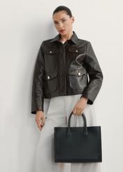 Women's black leather handbag TORES-1206-9I(W26), product view in model's hand. Half of silhouette visible.