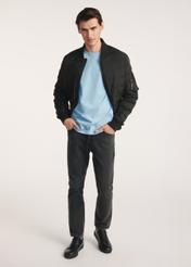 Black insulated men's bomber jacket KURMT-0362-99(Z25), product visible from the front on the model, the entire silhouette is visible.