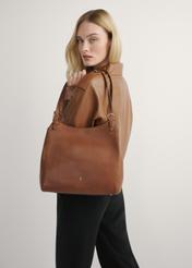 Brown leather women's handbag TORES-1106-1F(W26), product view on model's shoulder. Half of silhouette visible.