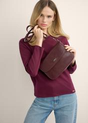 Burgundy women's shoulder bag TOREC-1262-4D(Z26), view of the product in the model's hands, on a light background.
