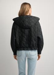 Black KURDT-0660-99(W26) oversized quilted jacket - back view of the product, on a model, against a light background. Knee-length silhouette visible.