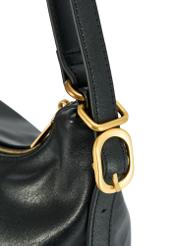 Black women's shopper handbag TOREC-1083-99(Z25), close-up of the product buckle, view on a white background.