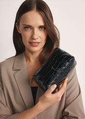 Black croco leather cosmetic bag TORES-1235-9G(W26), view of the product in the model's hand on a light background.